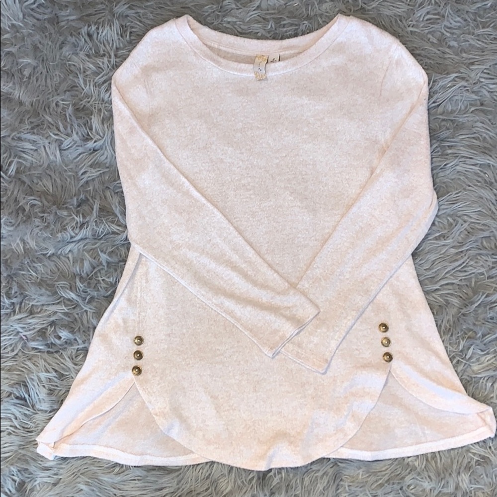 Light pink long sleeve shirt.